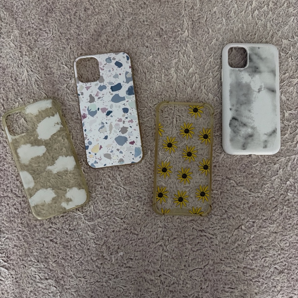 Bundle of Iphone 11 cases. Has some wear.